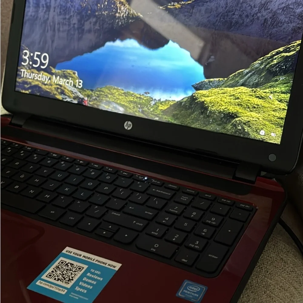 HP Red and Black Laptop with Full Keyboard and Modern Design